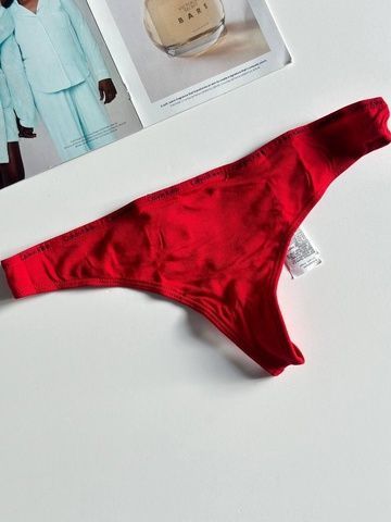 Трусики-стринги женские Calvin Klein красные 7a1-bca фото