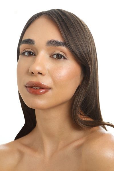 Блиск для губ з ароматом шоколадного брауні UNICO LIP GLOSS BROWNIE 12 мл 0024 фото