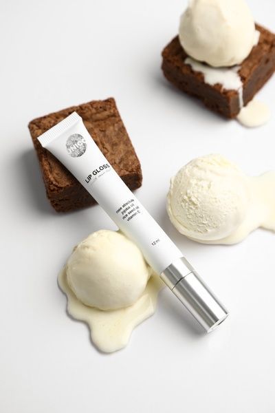 Блиск для губ з ароматом шоколадного брауні UNICO LIP GLOSS BROWNIE 12 мл 0024 фото
