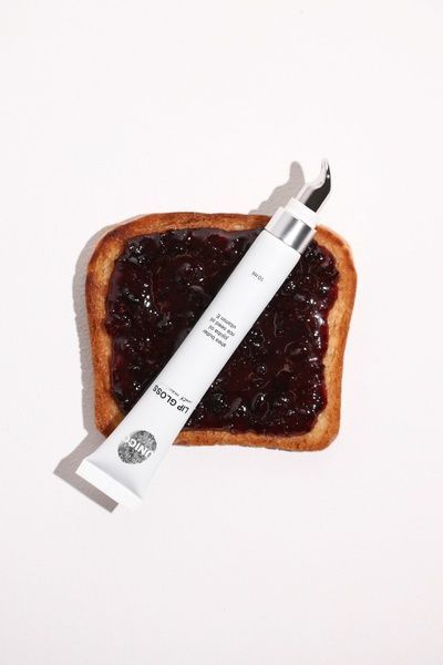 Блиск для губ з ароматом чорнично-ожинового джему UNICO LIP GLOSS JAM 12 мл 0026 фото